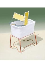 Plastic uncapping bench with foot